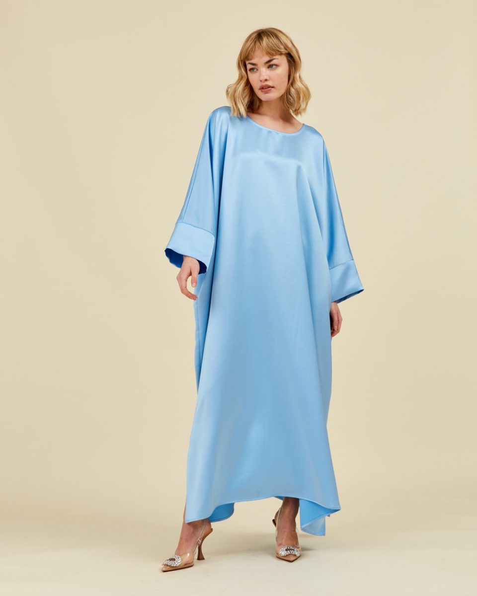 https://www.seamehappy.be/wp-content/uploads/2023/01/Sea-Me-Happy-Soraya-Dress-Satin-light-blue-front1-960x1200.jpg